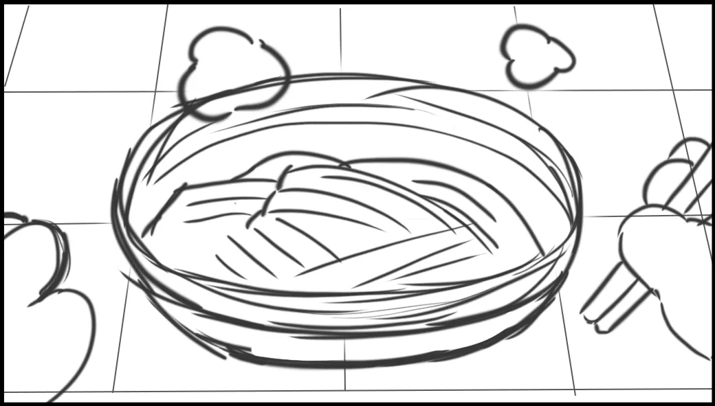 Close on a bowl of noodles and chopsticks.