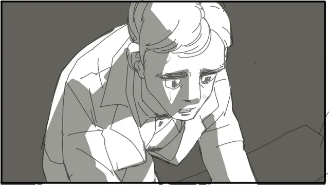 Close-up of the boy, dim light.